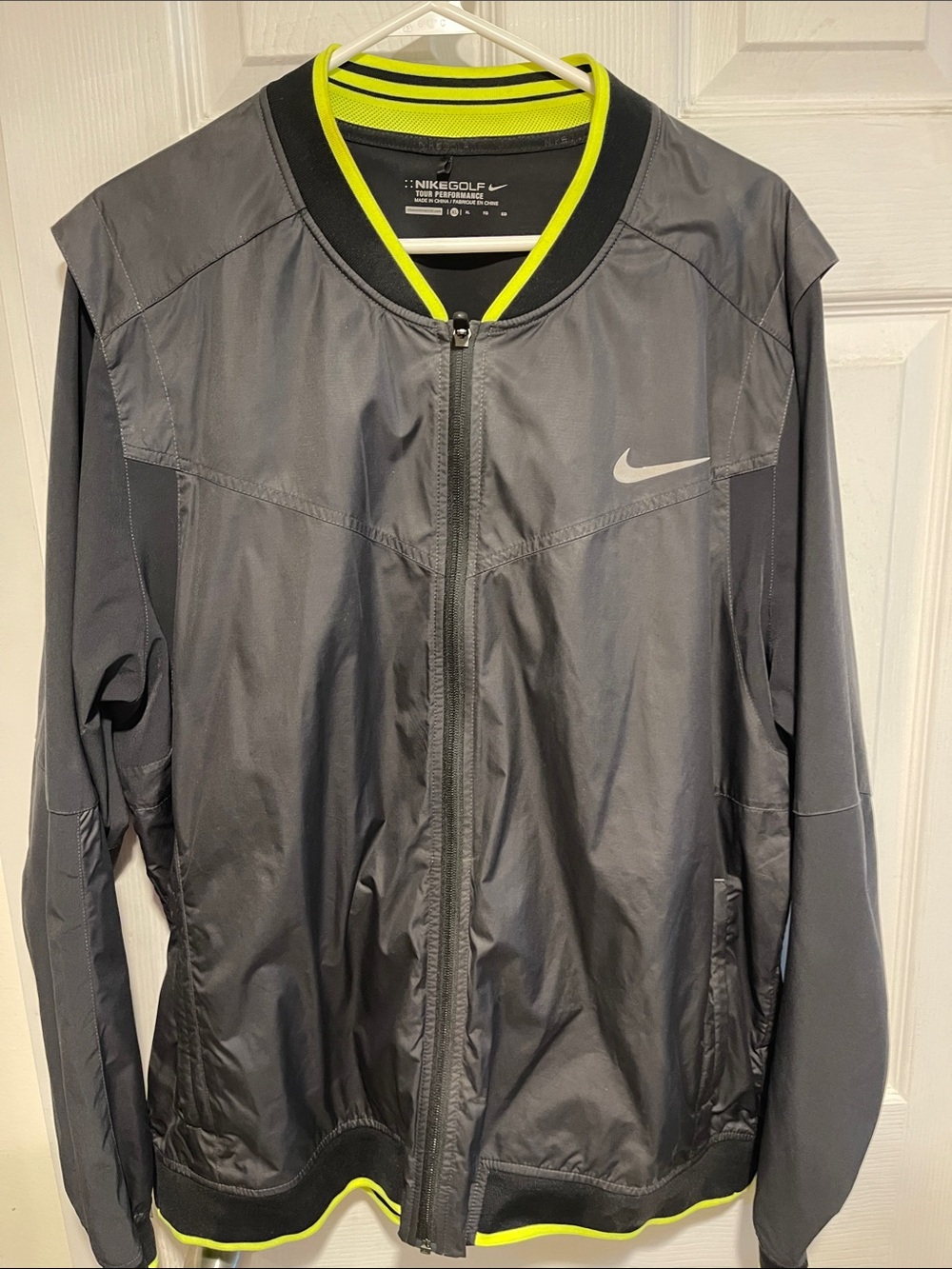 Nike Men’s Black Jacket with Neon Yellow Accents